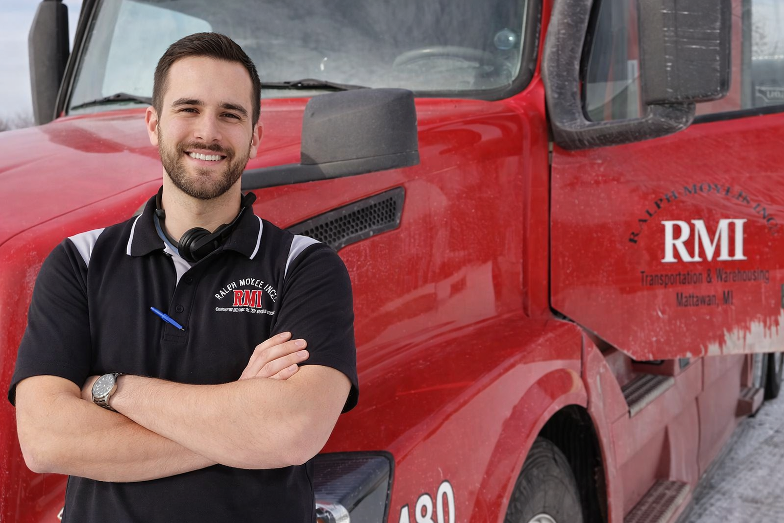 Driver standing next to his RMI truck